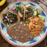 L->R: carne asada, fish taco, and carnitas with beans and rice😍  at Sugar Taco in Long Beach