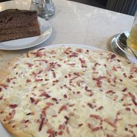 Flammkuchen, sachertorte and tea  at Café Windstill in Vienna