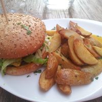 Burger vegan, steak de lentilles, cheddar vegan, pommes de terre sautées at Le Grenier de Notre Dame in Paris