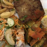 Seitan escalope, roast potatoes, ratatouille, raw veggies with mustard   at Le Grenier de Notre Dame in Paris