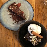 Desserts : gâteau chocolat et brownie accompagné d’une boule de sorbet saveur « rose"  at Le Grenier de Notre Dame in Paris