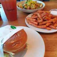 "Fish" burger, sweet potato fries and a bowl at Veggie Grill by Next Level - The Dome in Hollywood