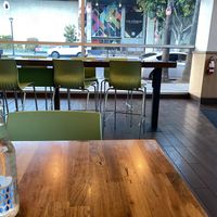 Tall Seating and Booth Style in Back  at Next Level Veggie Grill - The Dome in Hollywood