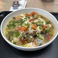 Hot rice noodles with vegetables with a veggie broth. Add the garlic as it was quite flavourless without it.   at Urban Pantry in Orlando