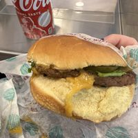 Cheeseburger and coke  at PLNT Burger - Bryant Park in New York City
