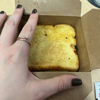 Patty melt, hand for scale   at PLNT Burger - Bryant Park in New York City