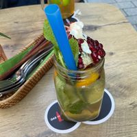 Iced tea with yuzu and pomegranate   at Vegana Vietnamese Restaurant in Mannheim