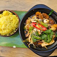 45 Bowl Lòng Kho Nâ´m - braised seitan, mushrooms, pepper, sesame rice at Vegana Vietnamese Restaurant in Mannheim