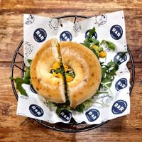 Vegan bagel:
R&R's House Hummus, Smashed Avocado, Arugula, Almonds, Amino, Chia Seeds at R&R Bagels in Hong Kong Island