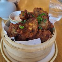 Corn inside. Chilli sauce. Delicious entrée. at RĪSI+NŪDELES in Liepaja