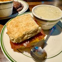 2/3 specials: bacon, “egg” & “cheddar” biscuit with a side of grits  at the HOOT in Columbia