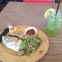 Vegan Calzone with quinoa and white bean salad with a refreshing elderflower,lime, cucumber and mint juice at The Good Loaf Sourdough Bakery and Cafe in Bendigo