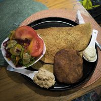 Burrito de quinoa (el falafel vino emplatado aquí, pero es del otro plato) at Lewis's House in Puerto Viejo De Talamanca