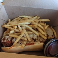 Vegan meatball sandwich with fries. To go! at Slice of Vegas Pizza in Las Vegas
