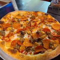 Vegan meatless meat lovers pizza at Slice of Vegas Pizza in Las Vegas
