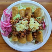potato taquitos with garbanzo beans al pastor at Tito's Taquitos - Swan Island in Portland