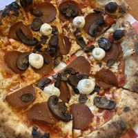 Pepperoni and mushroom pizza with cashew cheese    at Vegan Pizza Land in Easthampton