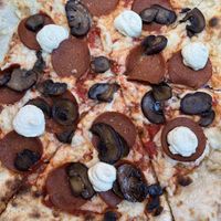 pepperoni, mushroom, and housemade "ricotta" pizzaa  at Vegan Pizza Land in Easthampton