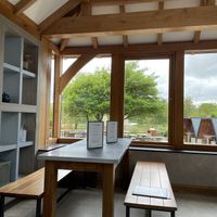View of deck, outdoor seating, and landscape beyond   at The Farmhouse Kitchen in Abingdon