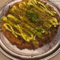 Galette vegan aux oignons verts at Maslow in Paris