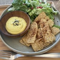 Sliced tempeh with vegan cheese and salad  at Yu Dei 余地 in Kowloon