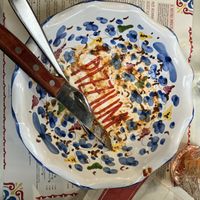 Lovely custom plates that reveal the restaurant’s name as you eat   at Pizzium - Via Arco in Milan