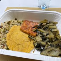 Cotoletta di tofu, farinata con verdure, cicoria, riso con broccoli at Cibó Vegan Food in Milan