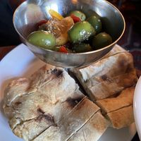 Olives and house bread  at Ravintola Elm  in Helsinki