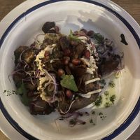 Baked Sweet Potato with Tahini and Caramelized Onions  at Botanic Restobar in Mallorca