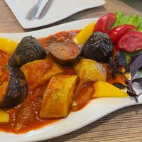 The menu described this dish as "warm vegetable salad" They're not wrong.  at Bonu Resturan in Dushanbe
