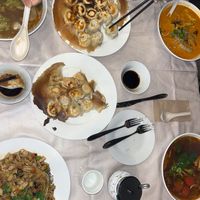 Qi Shan Minced Noodles (bottom left), Laksa Noodles Soup (top right) and dumplings  at Joyve Cafe in Auckland