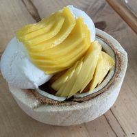 Sundae w Mango Topping, Coconut Ice Cream, Thai Tea Ice Creamm  at Coco Bomb in San Diego