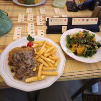 Schnitzel mit Pilzen und Salat at Die Sonnenuhr in Zeltingen