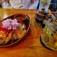 Baked dumplings and orange lemonade at Padme Hum  in Munich