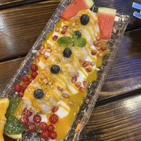 dessert with coconut, mango and melonn  at Padme Hum  in Munich