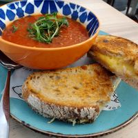 Tomato and red pepper soup with a vegan grilled cheese at Dudley and George's in Llandudno