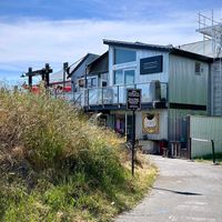 Take the path that leads to Over Board Ice Cream beneath the Breakwater Bistro at Overboard Ice Cream in Victoria