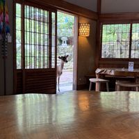 Friend checks to see if all is well  at Rokaku Tea House - Hexagon Cafe  in Miyajima