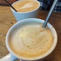 Bigass coffees with oat milk at Green Caffè Nero in Warsaw