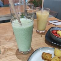 Green and yellow smothie at Morgentau. in Barcelona
