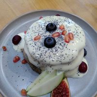 Blueberry poppyseed pancakes with lemon sauce at Morgentau. in Barcelona