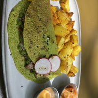 Chickpea omelet w peas mushroom and cheese   at Morgentau. in Barcelona