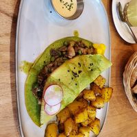 Pea mushroom Omlette with potatoes at Morgentau. in Barcelona