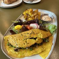 Omellete (in the back chocolat croissant)  at Morgentau. in Barcelona