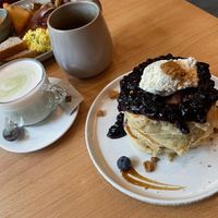 Blueberry pancakes and matcha latte  at Morgentau. in Barcelona
