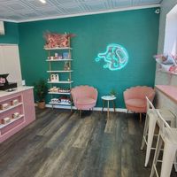 inside with a couple counter top seats at Flourhouse Bakery at Mike & Patty's in Newton