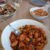 Beans and hummus ( on the left is a vegetarian dish called imam) at O Aetos - Ο Αετός Restaurant in Pylos