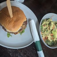 Burger and kale salad at Wahlburgers in Byron Bay
