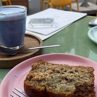 Butterfly pea latte and banana bread😋  at Farm Girl in South West London