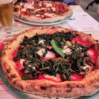 Vegan mozzarella with (front pizza) cicoria, olives and red onions, (back pizza) mushrooms and onions. at Pizzium - Varese in Varese